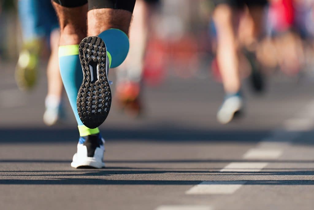 marathon runners illustrating someone falling behind from the competition